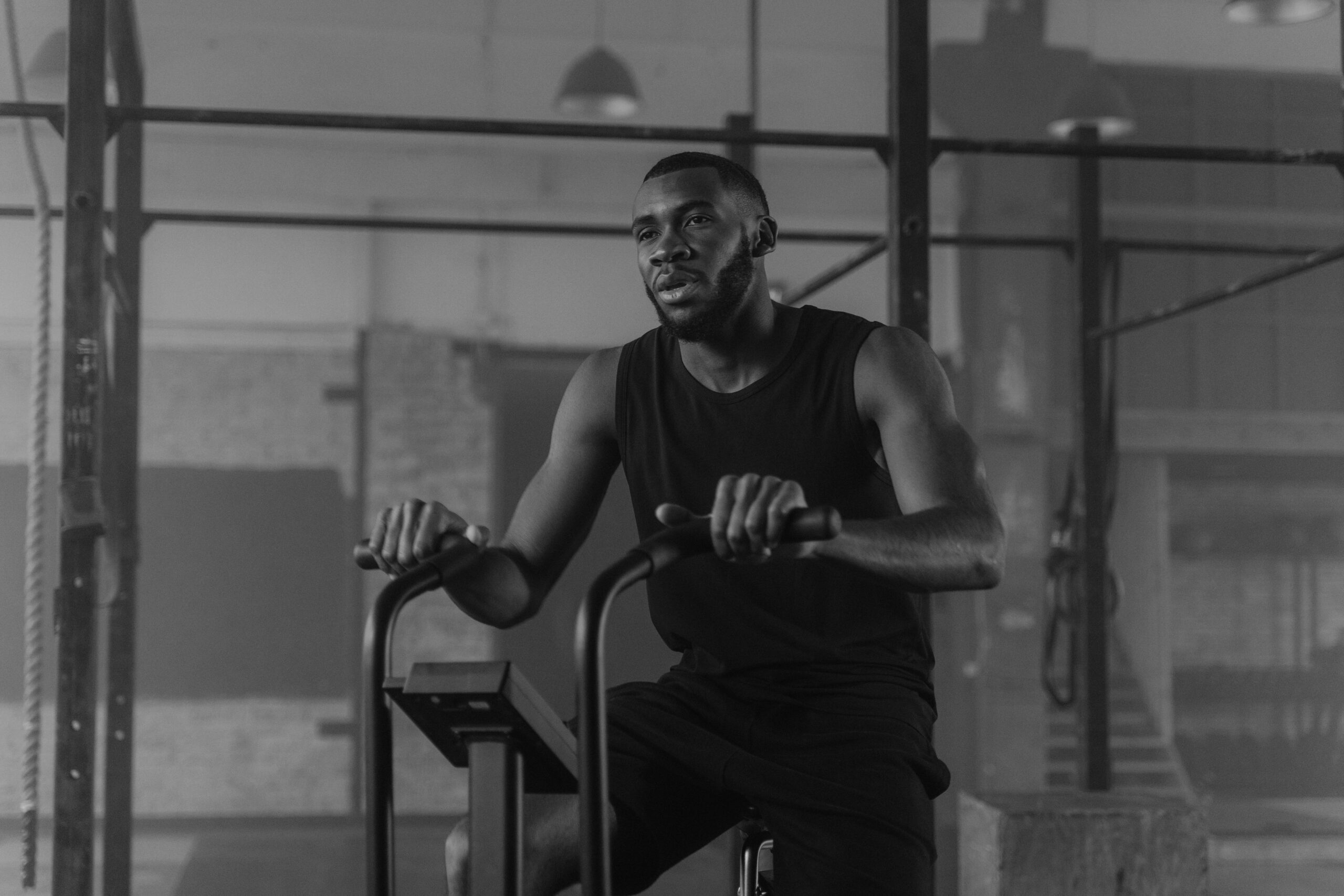 A Man Working Out with a Stationary Bike